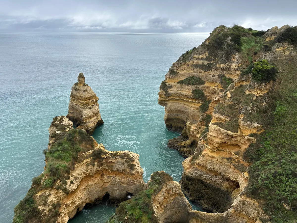 Atlantic Ocean cliffs and sea stack along Portugal’s Algarve coast